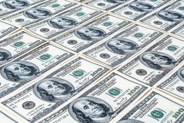 Yüz dolar. Amerikan doları geçmişi. Birçok banknot yüz dolarlık banknotlar halinde. Amerikan para birimi.