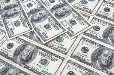 Yığınla yüz dolar. Amerikan doları geçmişi. Bir sürü banknot, yüz dolarlık banknotlar. Amerikan para birimi.