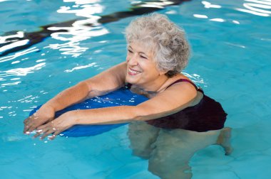 Senior woman swimming