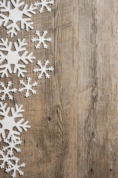 Schneeflocken auf Holztischbanner — Stockfoto