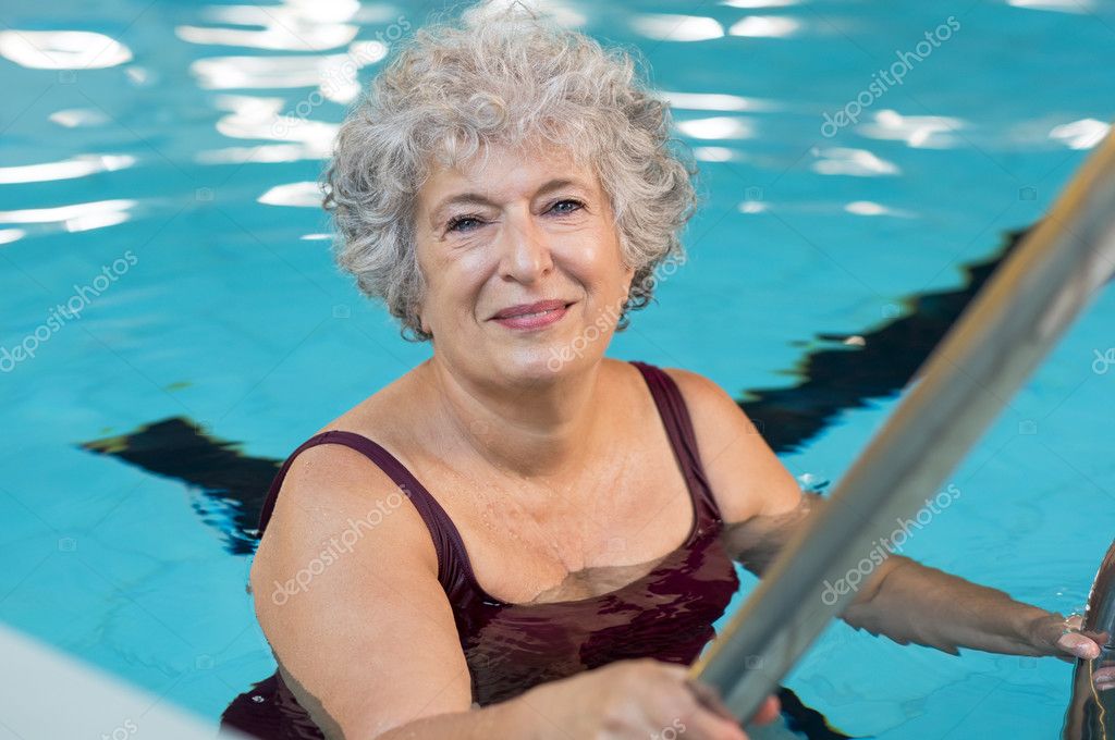 Senior woman at pool Stock Photo by ©ridofranz 125951870