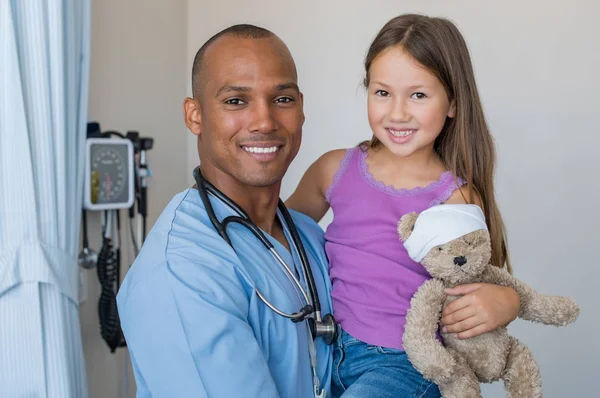 Nurse holding child — Stock Photo, Image