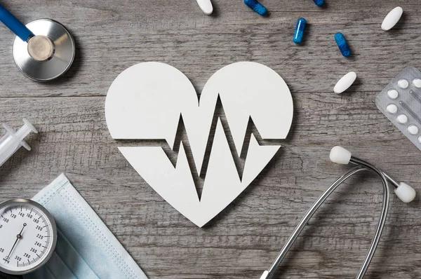 Doctor desk with heart shape — Stock Photo, Image