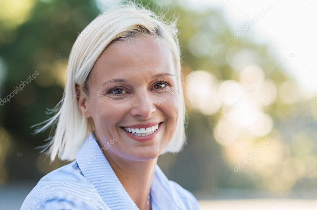 Happy mature woman smiling