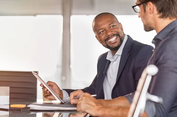 African businessmen in a conversation with colleague — Stock Photo, Image