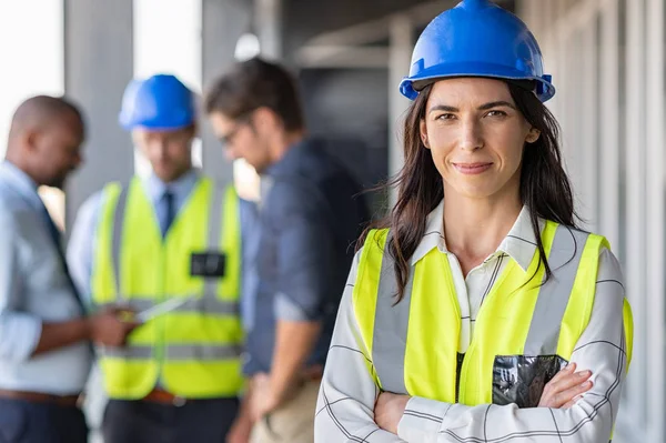 Confident architect at construction site — Stock Photo, Image