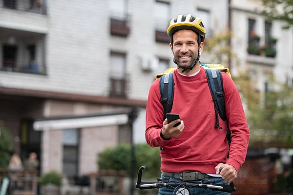 Food delivery boy on bicycle — Stock Photo, Image