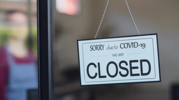 Small Business Owner Smiling While Turning Sign Reopening Place Quarantine — Stock Video