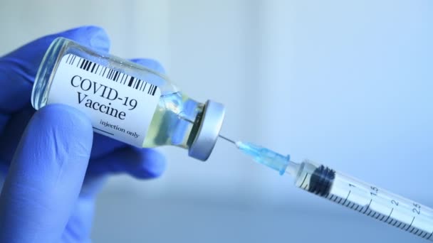 Doctor Drawing Covid Vaccine Phial Bottle Filling Syringe Injection Vaccination — Stock Video