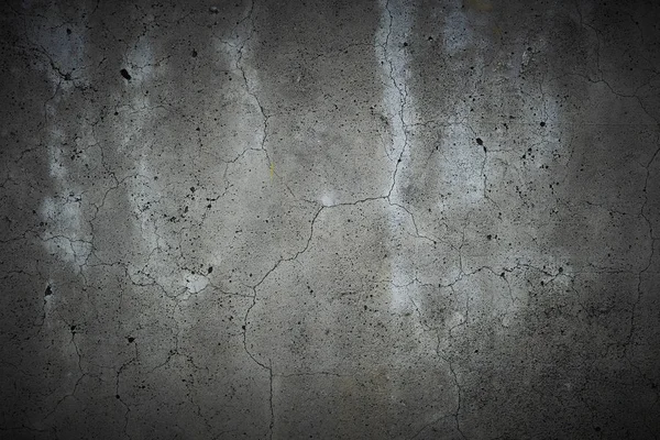 ince çatlaklar arka plan dokusu ile kırık beton duvar