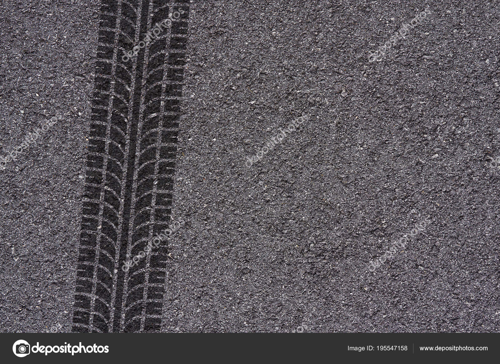 Tire marks on asphalt background texture Stock Photo by ©Schnoeppl