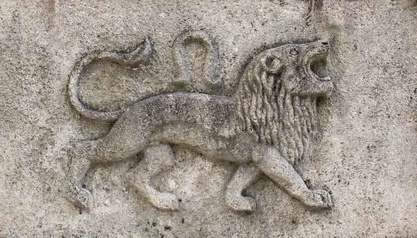 Zodiac - Leo or Lion, an old stone relief — ストック写真