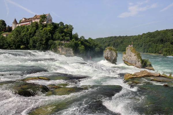 Rhine Falls with Calst Laufen at the background. — Stock Photo, Image