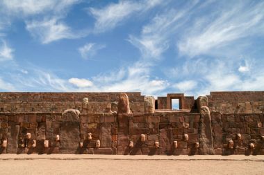 Architecture wall with stone faces of Tiwanaku, Bolivia clipart