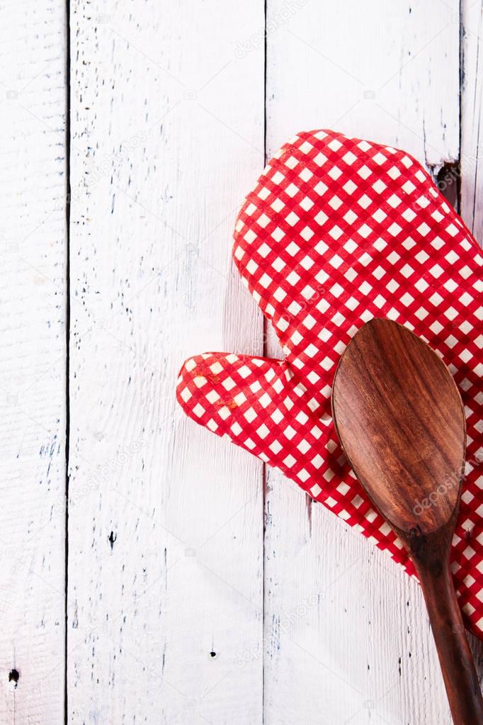 Kitchen Mitts and Wooden Spoon Top View