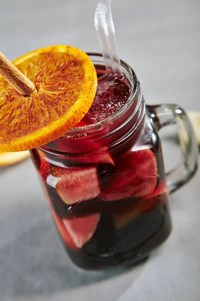 Red Sangria with Orange and Cinnamon Stick