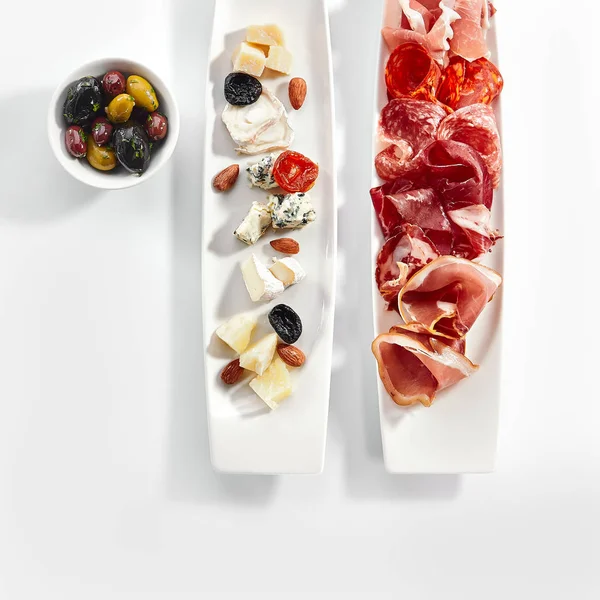 Antipasti on plates top view