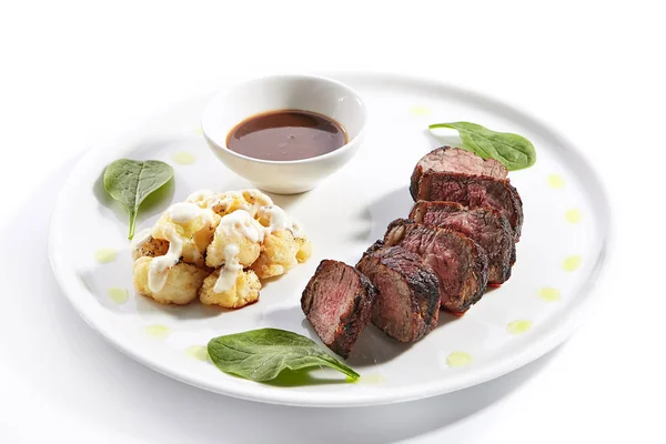 Beef steak with cauliflower dish top view — Stock Photo, Image