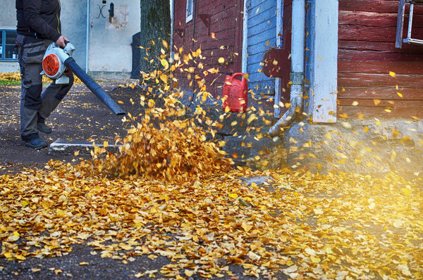 Leaf blower in autumn