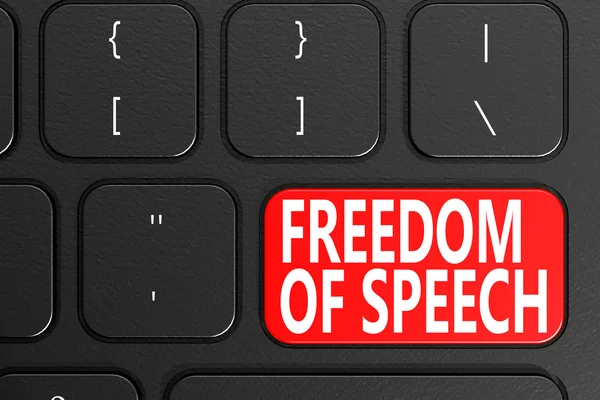 Свобода слова на черной клавиатуре — стоковое фото