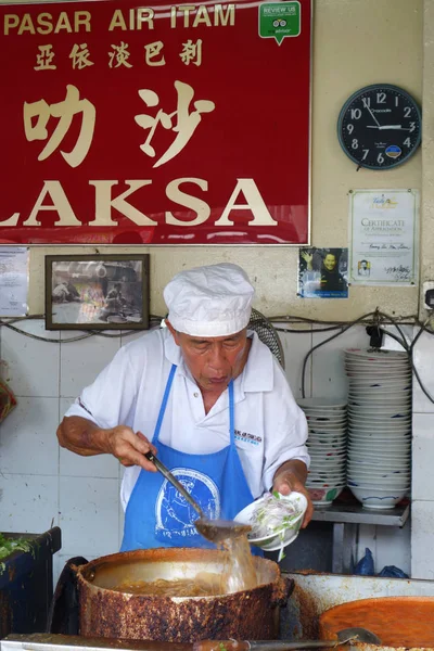 Hava Itam, kalem onların Assam Laksa şehriye ahır Hawker satıcıda