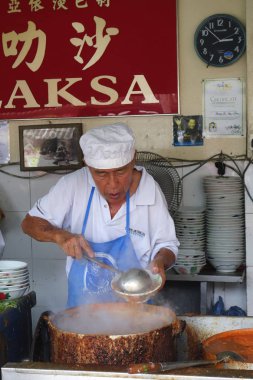 Hava Itam, kalem onların Assam Laksa şehriye ahır Hawker satıcıda