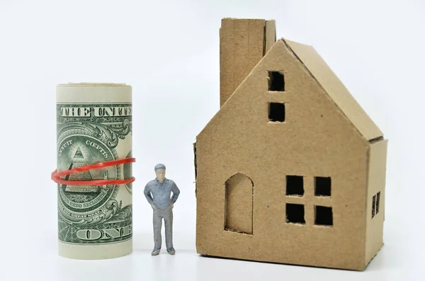Man with money and home — Stock Photo, Image
