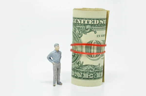 Figure of businessman and one dollar bill — Stock Photo, Image