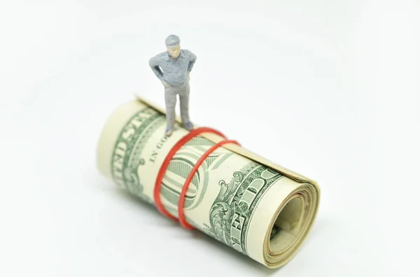 Figure of businessman on one dollar — Stock Photo, Image