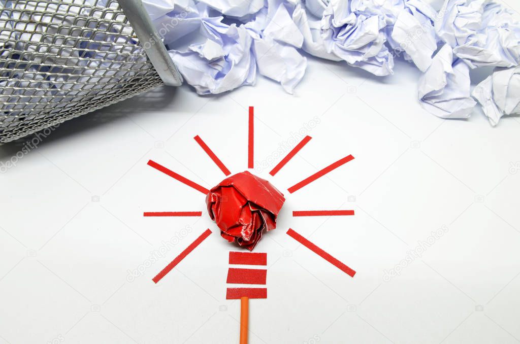 Crumpled paper light bulb metaphor for good idea
