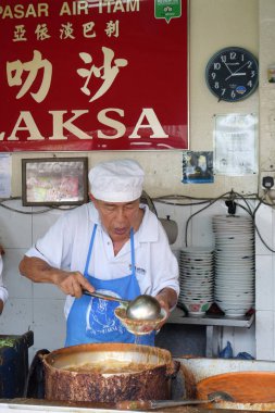 Hava Itam, kalem onların Assam Laksa şehriye ahır Hawker satıcıda