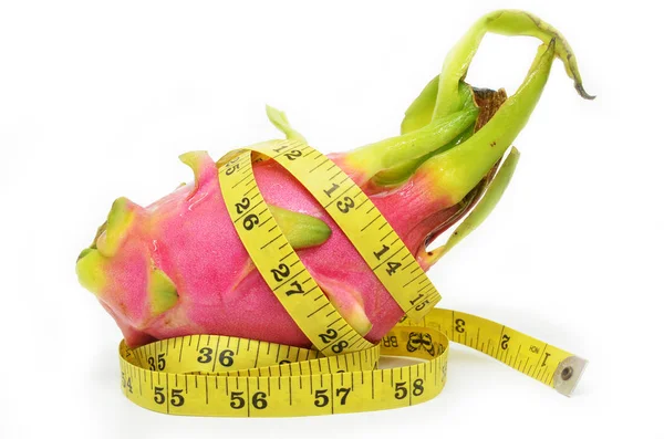 Dragon fruit and measure tape — Stock Photo, Image