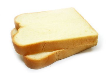 Beyaz arkaplanda izole edilmiş dilimlenmiş ekmek