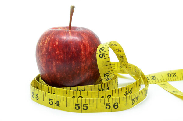 Red apple with measure tape