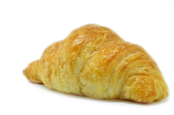 Croissant fresco isolado no fundo branco — Fotografia de Stock