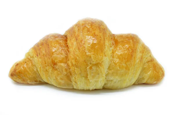 Croissant fresco isolado no fundo branco — Fotografia de Stock