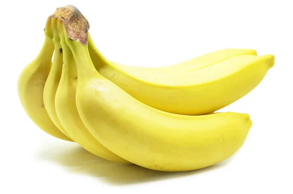 Żółte banany na białym tle — Zdjęcie stockowe