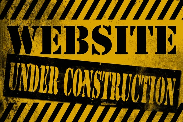 Sitio web en construcción signo amarillo con rayas — Foto de Stock