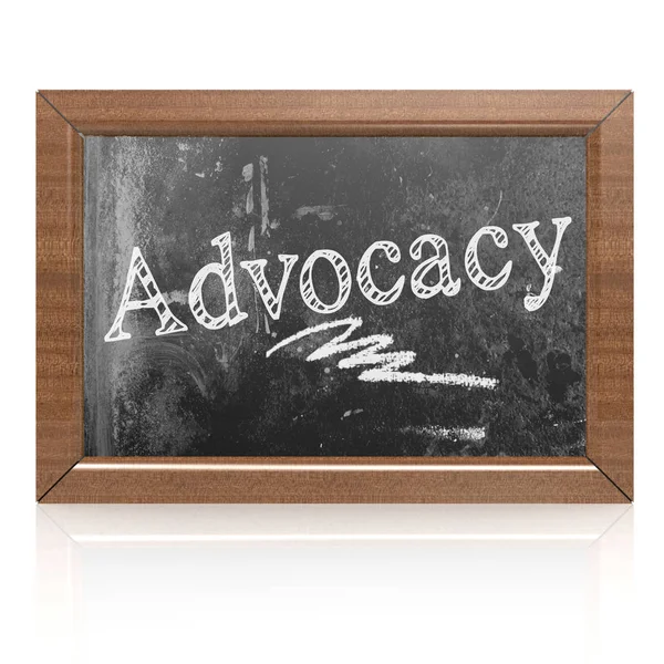 Advocacy text written on blackboard — Stock Photo, Image