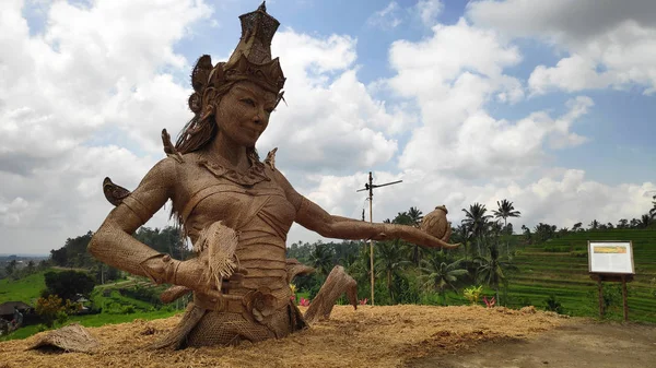 Female sculpture at rice fields of Jatiluwih in southeast Bali
