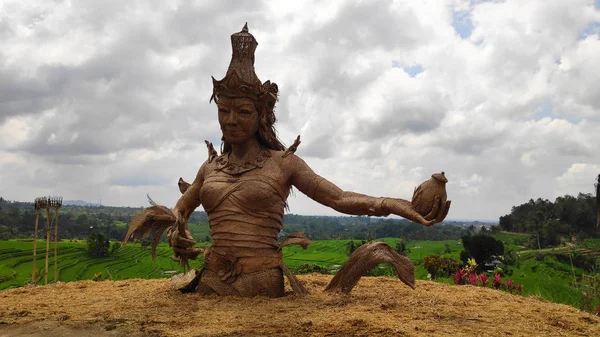 Female sculpture at rice fields of Jatiluwih in southeast Bali