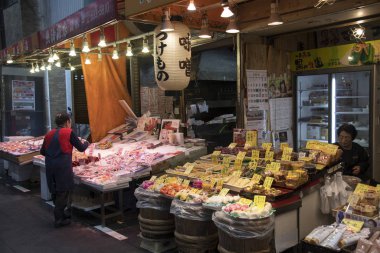 Vendors selling different goods at Kuromon Marke