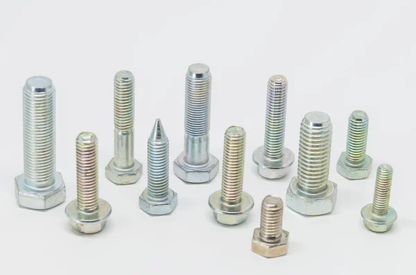 Group of Stainless steel bolt on white background and selective focus — Stock Photo, Image