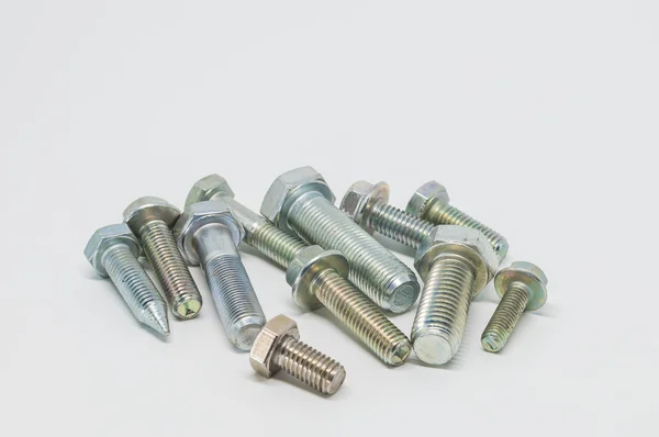 Group of Stainless steel bolt on white background and selective focus — Stock Photo, Image