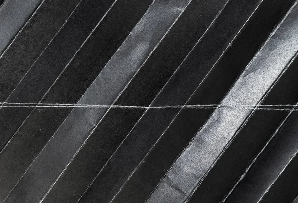 Çoklu katman için Çapraz biçiminde katlanmış siyah kağıt — Stok fotoğraf