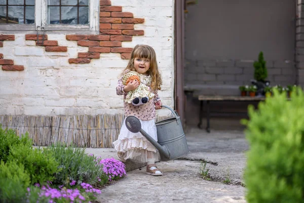 Little Girl Watering Can Doll Garden — Stock Photo, Image