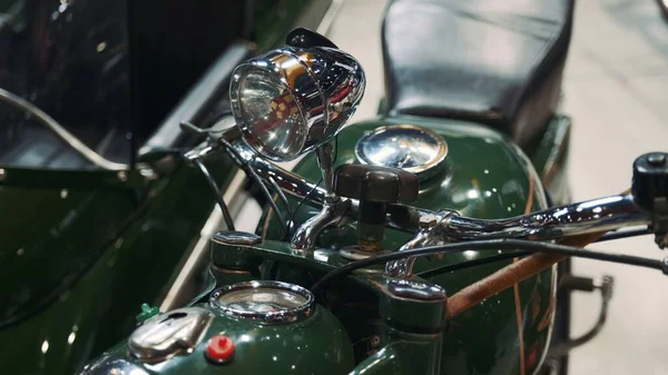 Close up of green motorcycle steering wheel — Stock Photo, Image