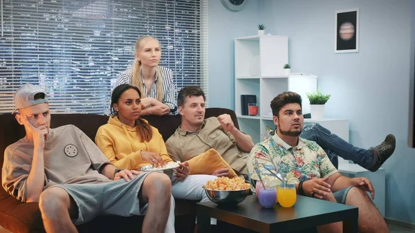 Group of friends are disappointed with their sport team play watched on TV — Stock Photo, Image