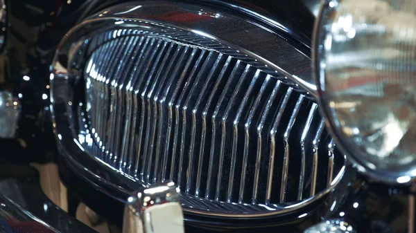 Shiny front radiator grill of black luxury retro car — Stock Photo, Image