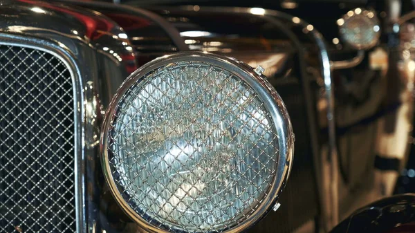 Close-up view of black vintage car headlight — Stock Photo, Image